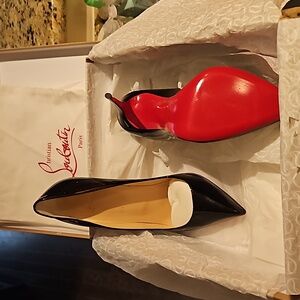 Louboutin 40.5